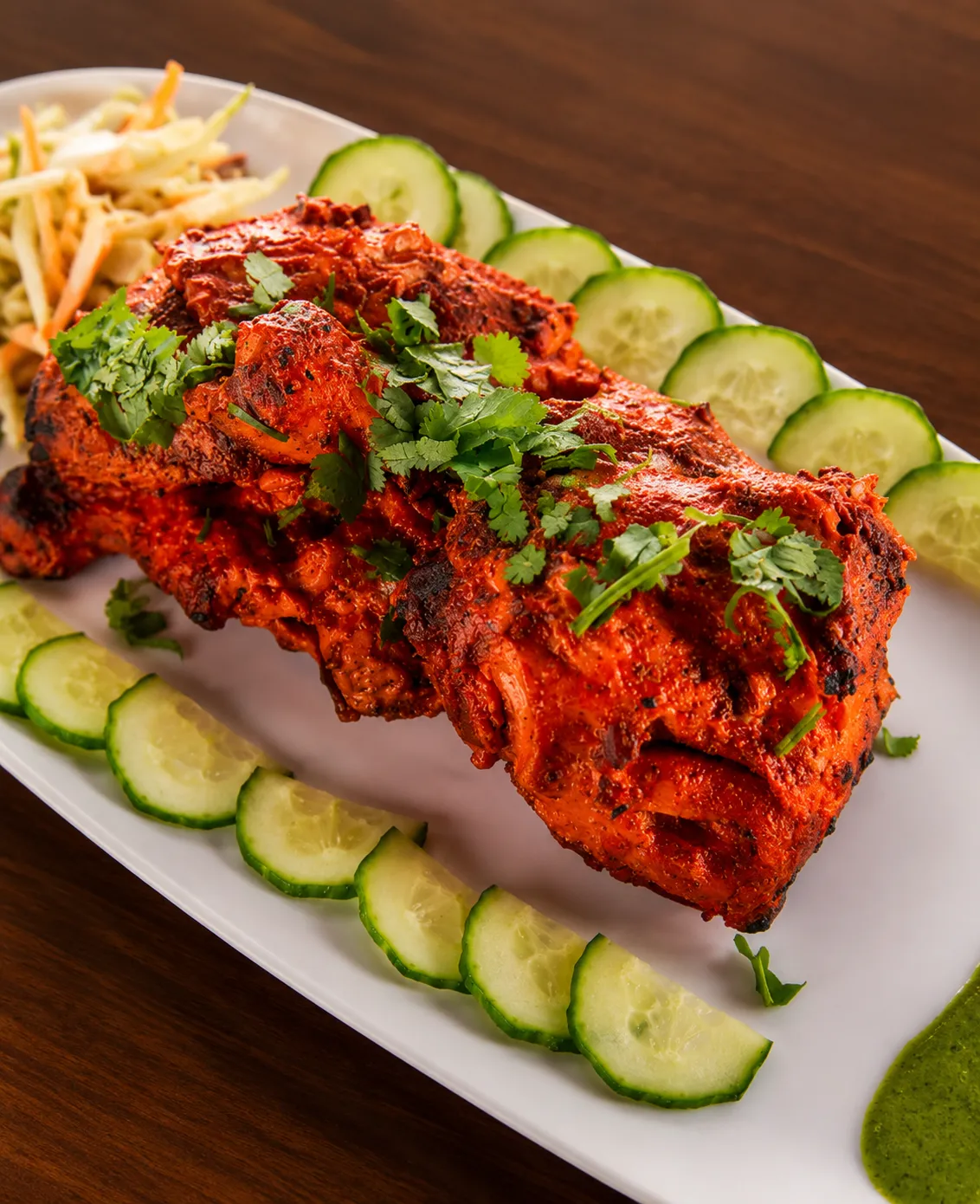 Tandoori chicken with onions and mint chutney at Tamarind East Indian Restaurant, Panorama Hills Calgary