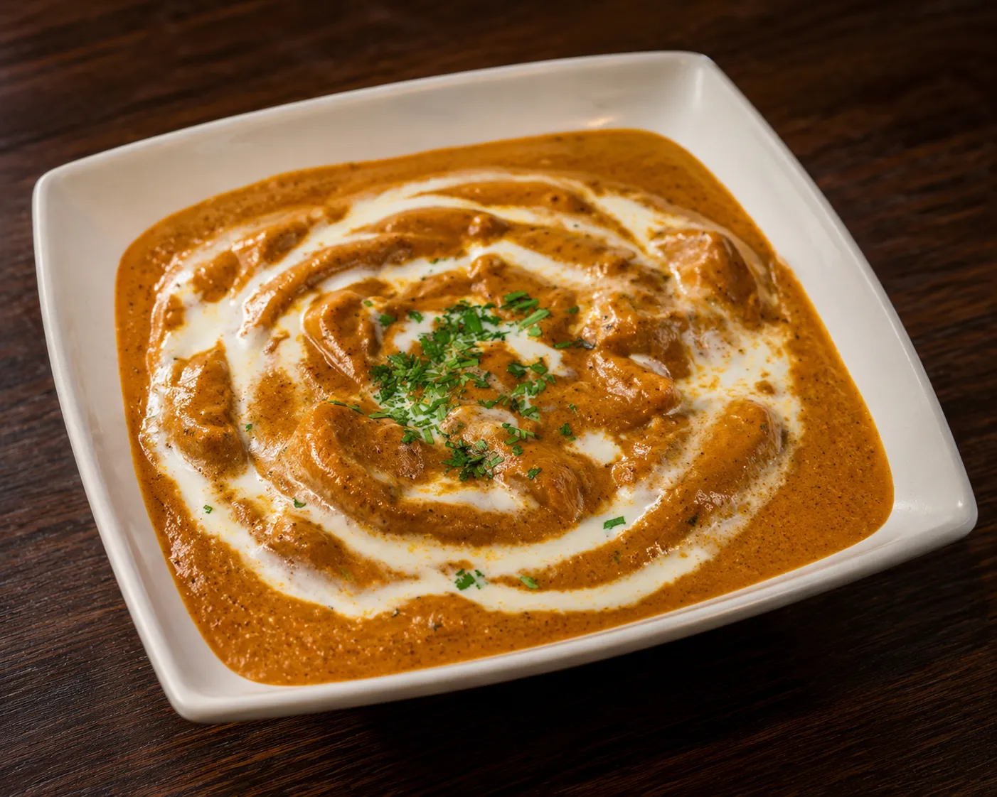 Kadai fish curry simmered with peppers and onions at Tamarind East Indian Restaurant, Panorama Hills Calgary
